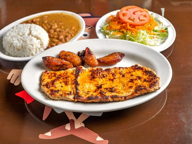 Lomo De Cerdo / Grilled Pork Loin Cutlet.