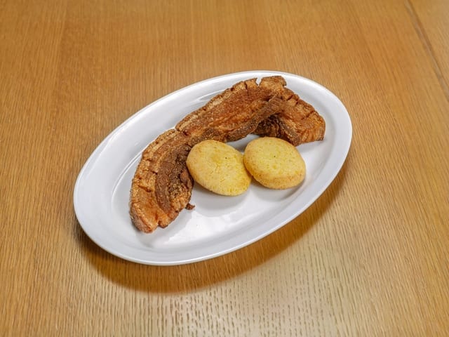 Chicharrón Con Arepa / Fried Pork Belly with Corn Cake.