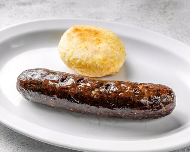 Morcilla Con Arepa / Colombian Blood Sausage.