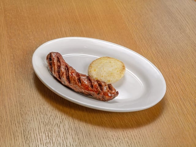 Chorizo Con Arepa / Colombian Chorizo with Corn Cake.