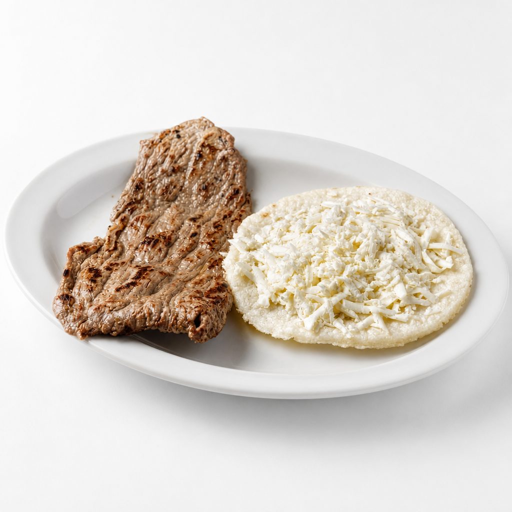 Carne Asada Con Arepa Tela.