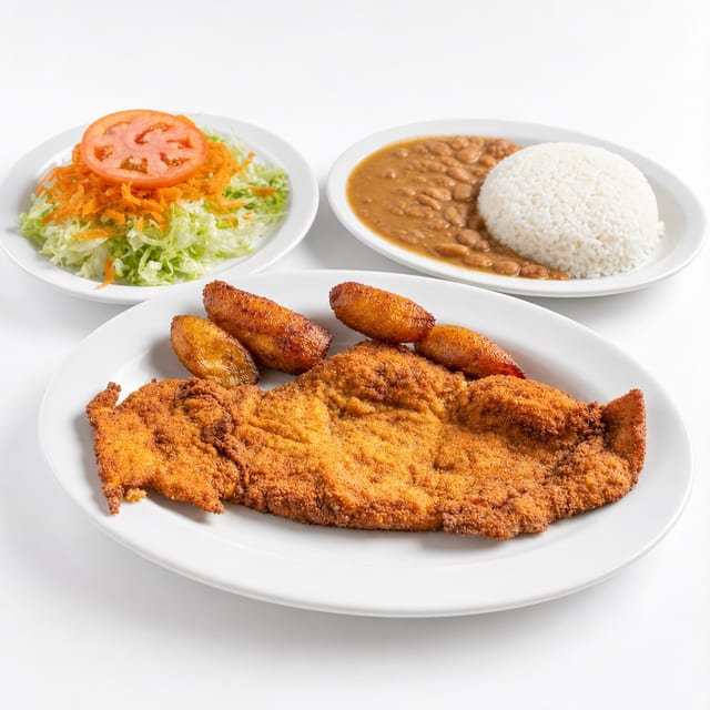 Chuleta De Pollo Empanizada.