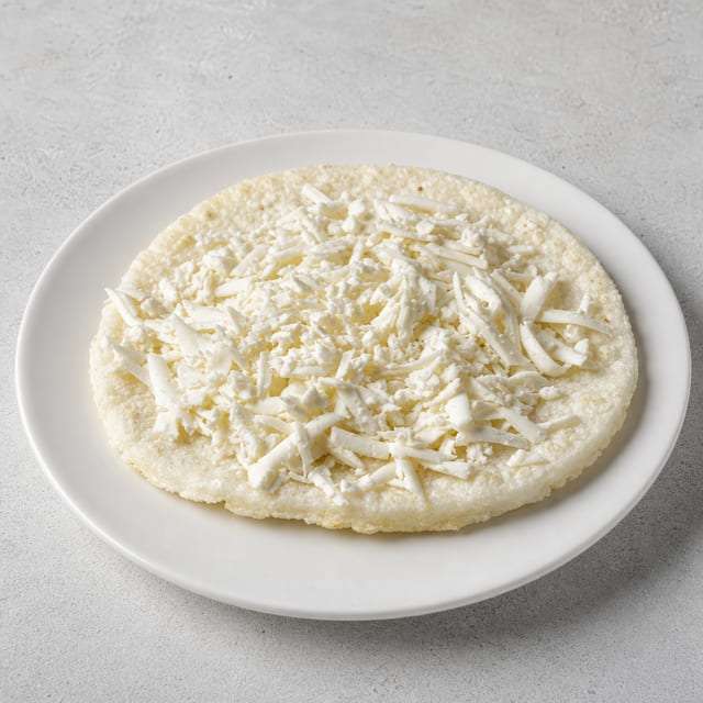 Arepa Tela / Flat Round Corn Cake with Cheese.