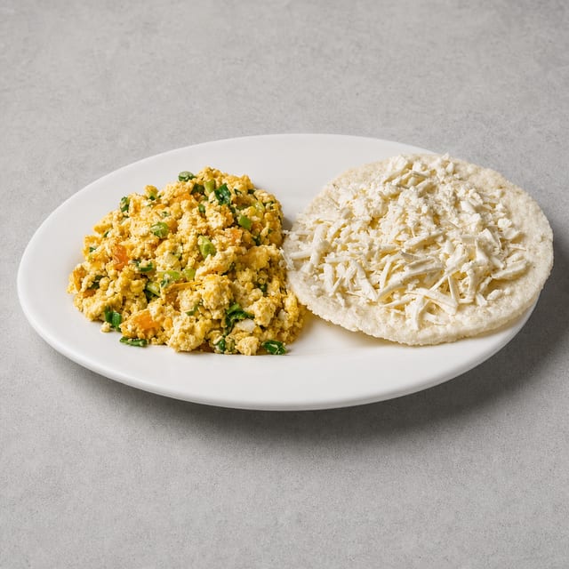 Huevos Pericos Con Arepa Tela.