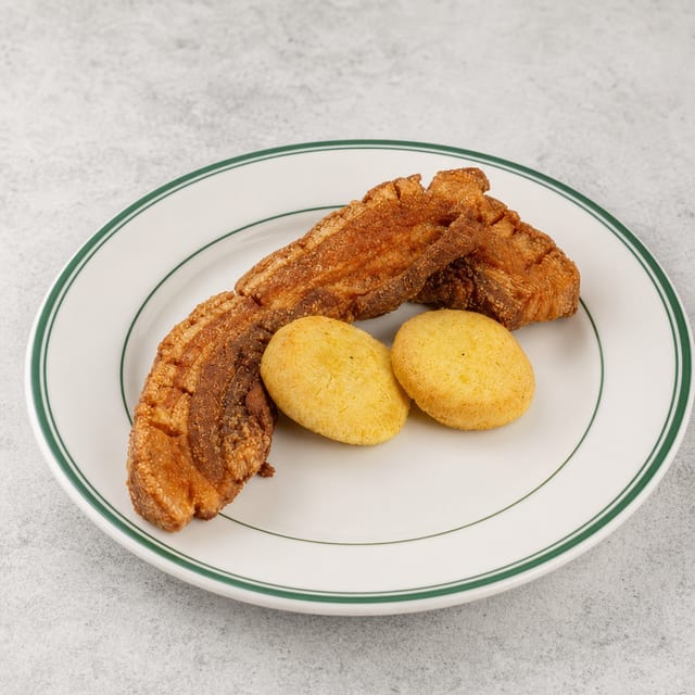 Chicharrón Con Arepa / Fried Pork Belly with Corn Cake.