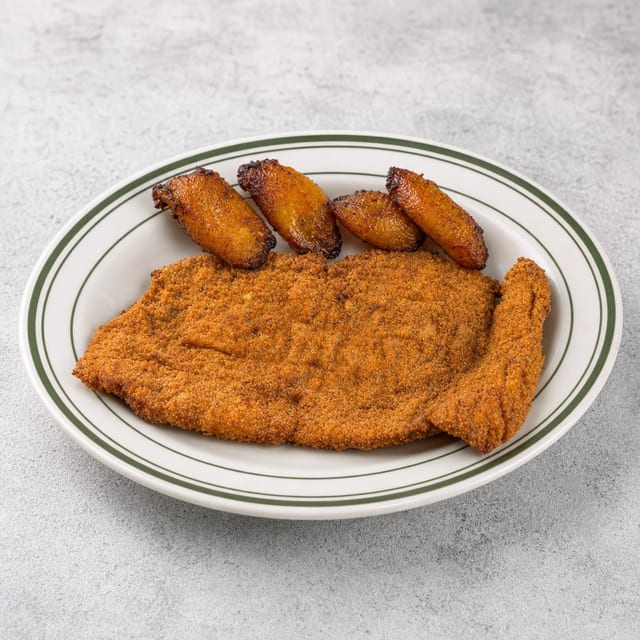 Chuleta De Pollo Empanizada / Breaded Fried Chicken Cutlet.