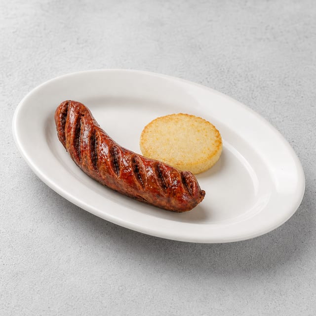 Chorizo Con Arepa / Colombian Chorizo with Corn Cake.