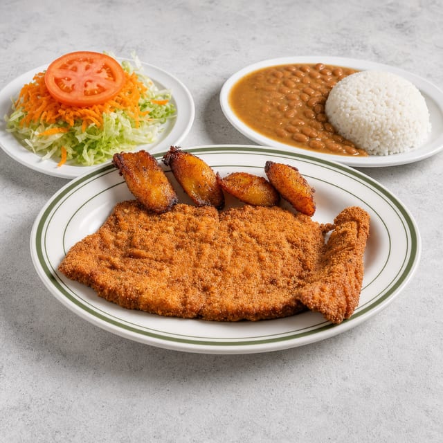 Chuleta De Pollo Empanizada / Breaded Fried Chicken Cutlet.