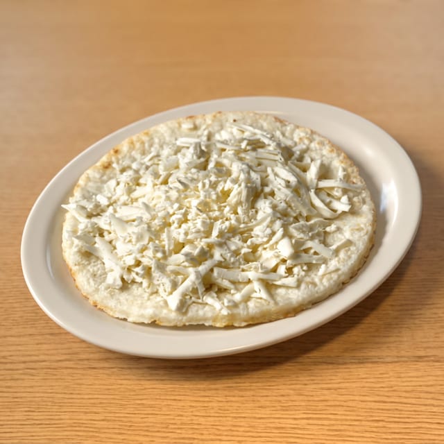 Arepa Tela / Flat Round Corn Cake with Cheese.