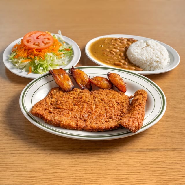 Chuleta Empanizada / Breaded Fried Pork Loin Cutlet.