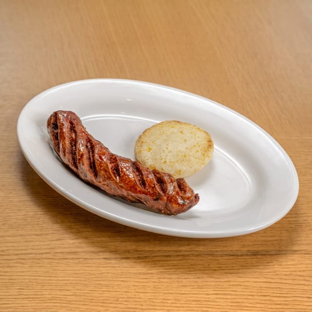 Chorizo Con Arepa / Colombian Chorizo with Corn Cake.