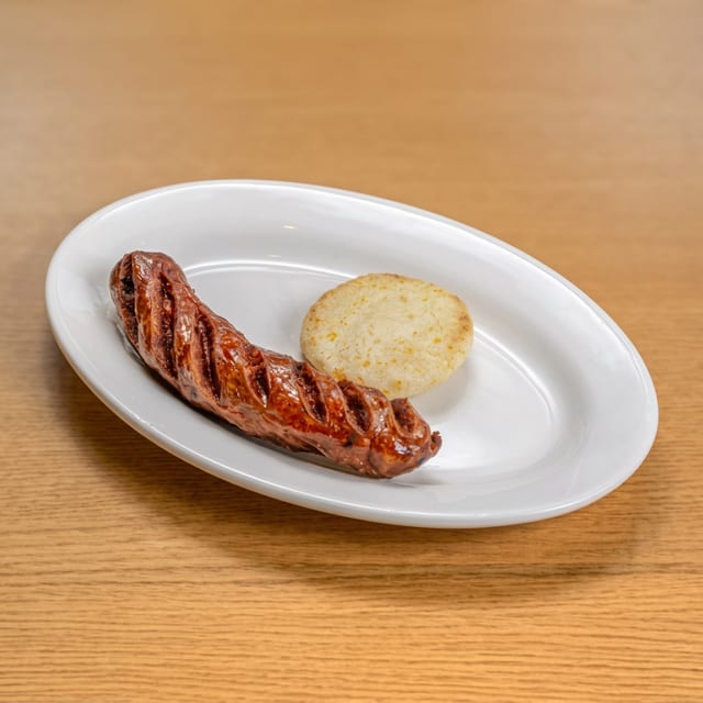 Chorizo Con Arepa / Colombian Chorizo with Corn Cake.