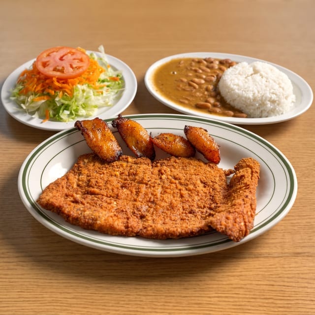 Chuleta Empanizada / Breaded Fried Pork Loin Cutlet.
